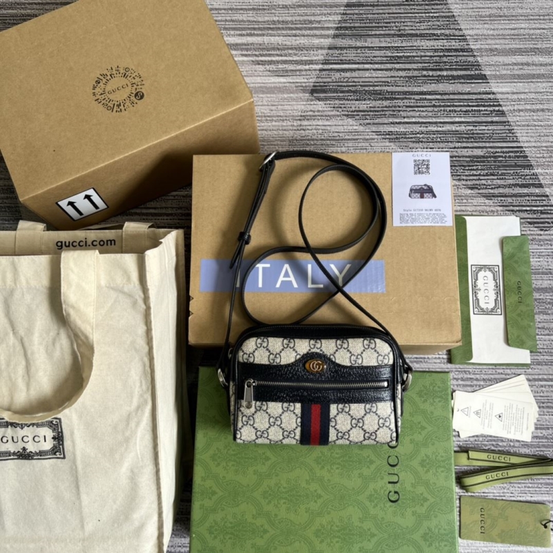 G*u*i satchel bags